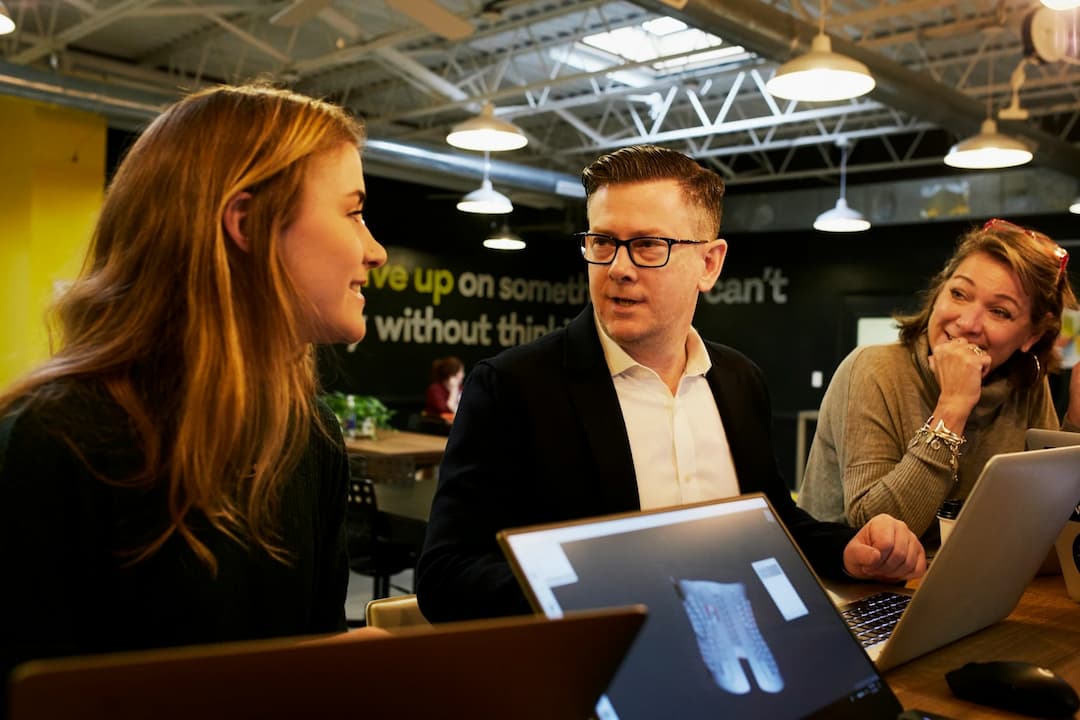 Group of people talking about arete hub